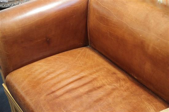 A David Linley tan leather settee, W.6ft D.2ft 6in. H.2ft 4in.